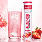 Glutathione tablet fizzing in a glass of water beside the tube