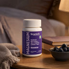 Magnesium Chewable bottle on a bedside table at night